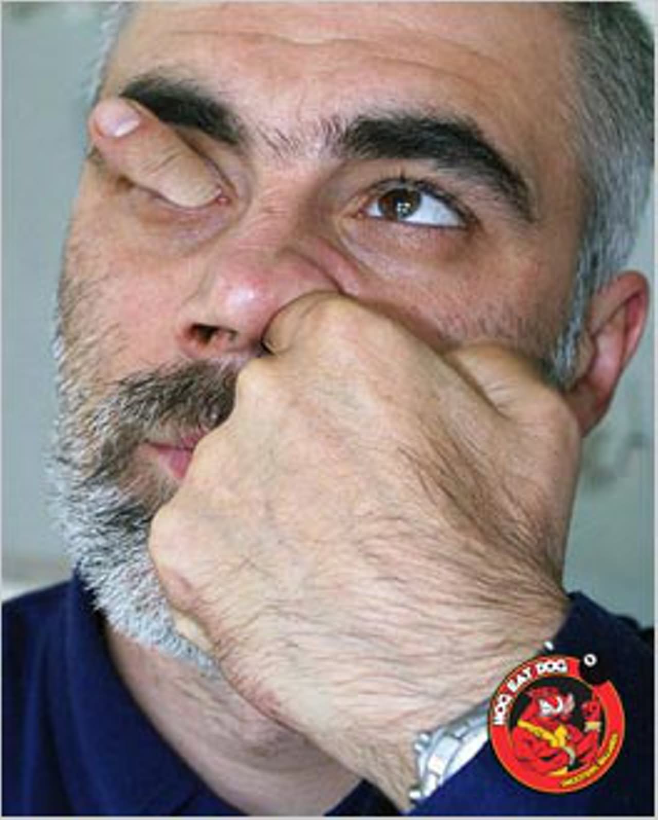 Man Passing Finger Form Nose To Eye Funny Picture