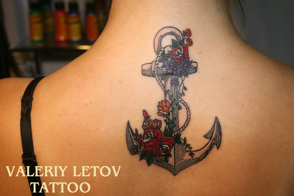 Red Rose Flowers And Anchor Tattoo On Upper Back