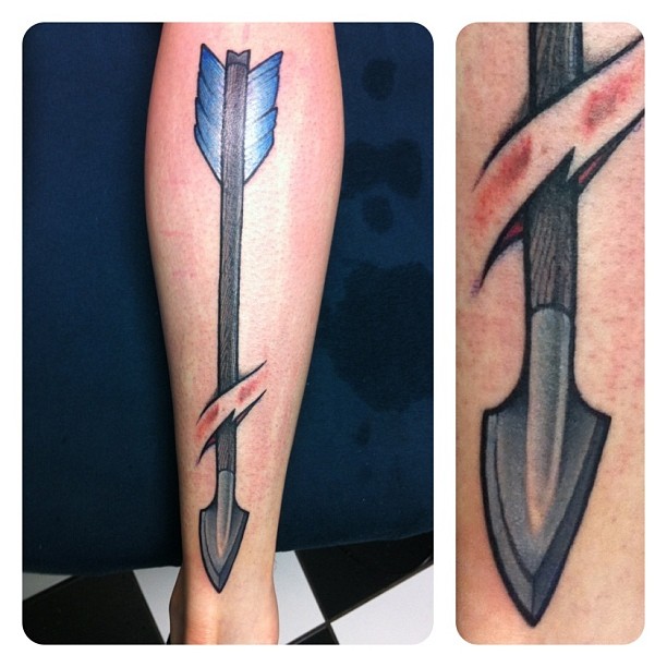 Ripped Skin Arrow Tattoo On Achilles