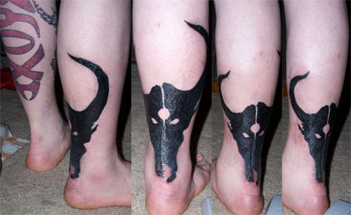 Silhouette Bull Skull Tattoo On Achilles