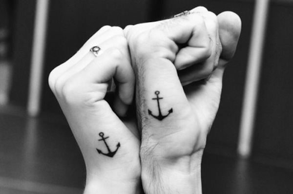 Simple Black Anchor Tattoos On Couple Hands