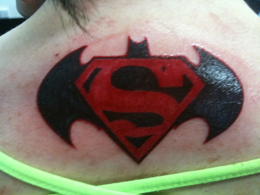 Superman And Batman Logo Tattoo Design For Upper Back By Mai Yumi