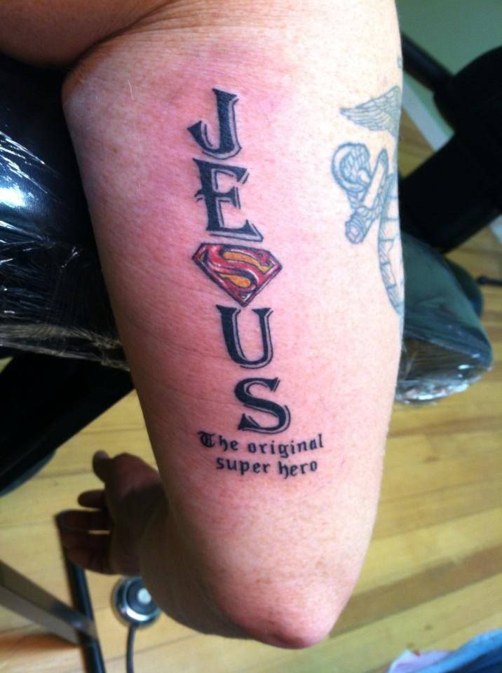 Superman Logo In Jesus Word Tattoo On Half Sleeve