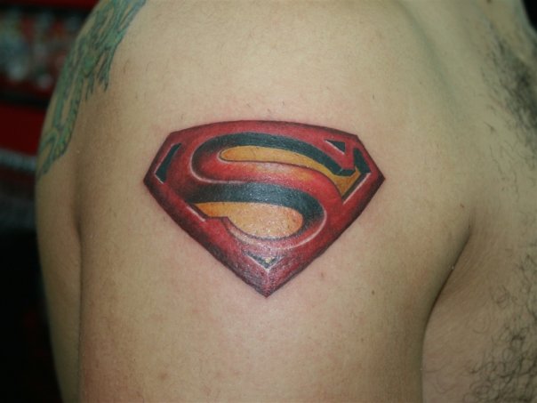 Superman Logo Tattoo On Right Shoulder By Vaso Vasiko