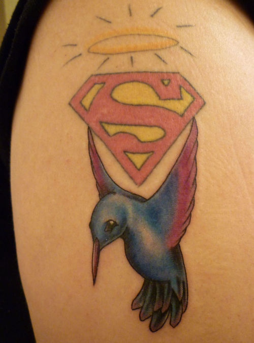Superman Logo With Hummingbird Tattoo Design For Shoulder