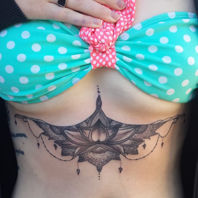 Attractive Lotus Flower Tattoo On Under Breast