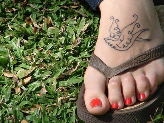 Awesome Black Outline Bird Tattoo On Girl Foot