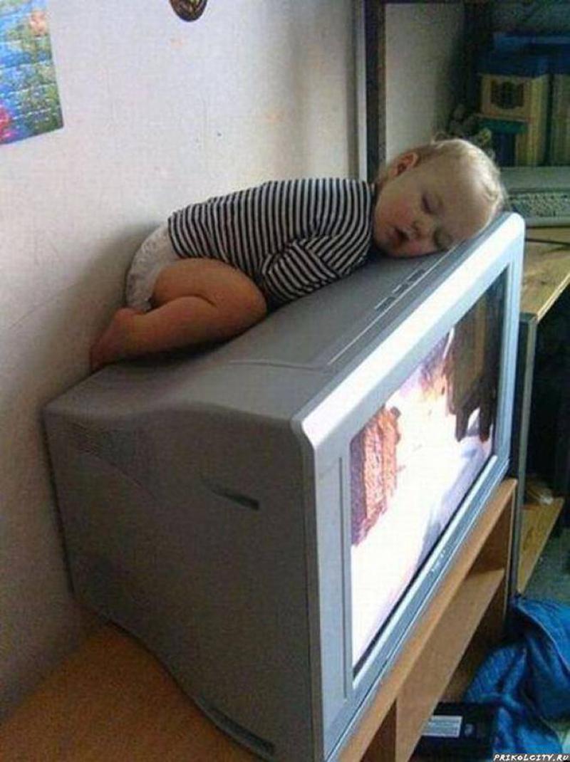 Baby Sleeping On Television Funny Picture
