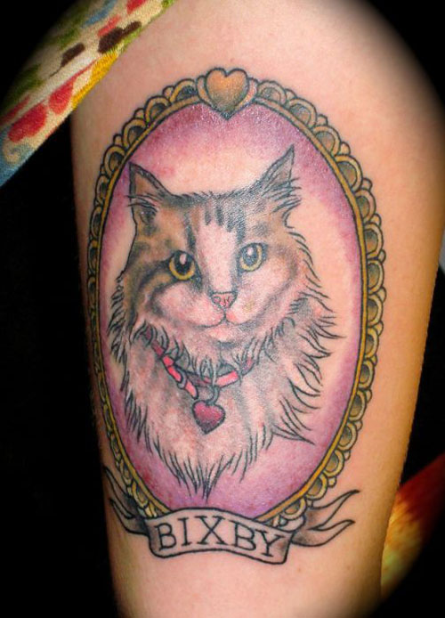 Beautiful Cat In Frame With Bixby Banner Tattoo On Thigh