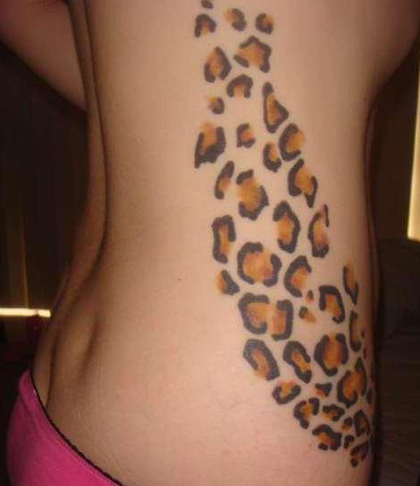 Beautiful Girl With Cheetah Print Tattoo On Side Rib