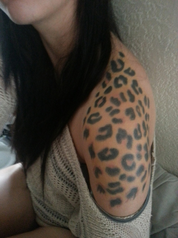 Black And Grey Cheetah Print Tattoo On Left Shoulder