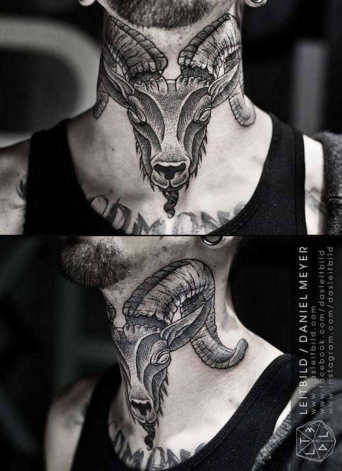 Black And Grey Goat Head Tattoo On Man Back