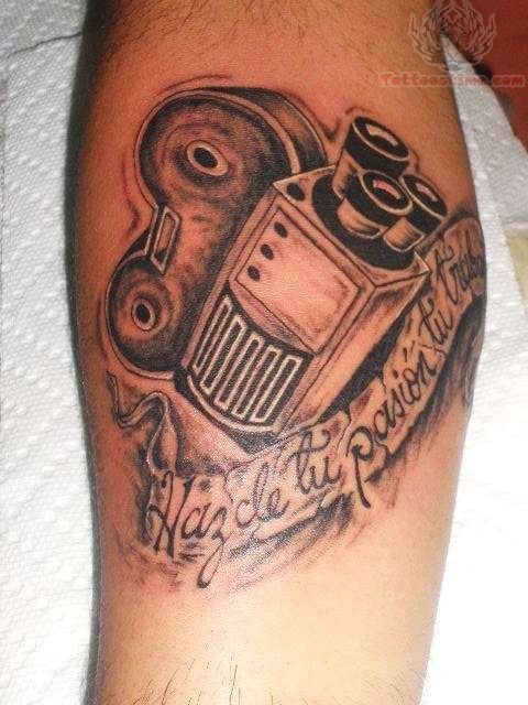 Black And Grey Movie Camera With Banner Tattoo Design For Forearm