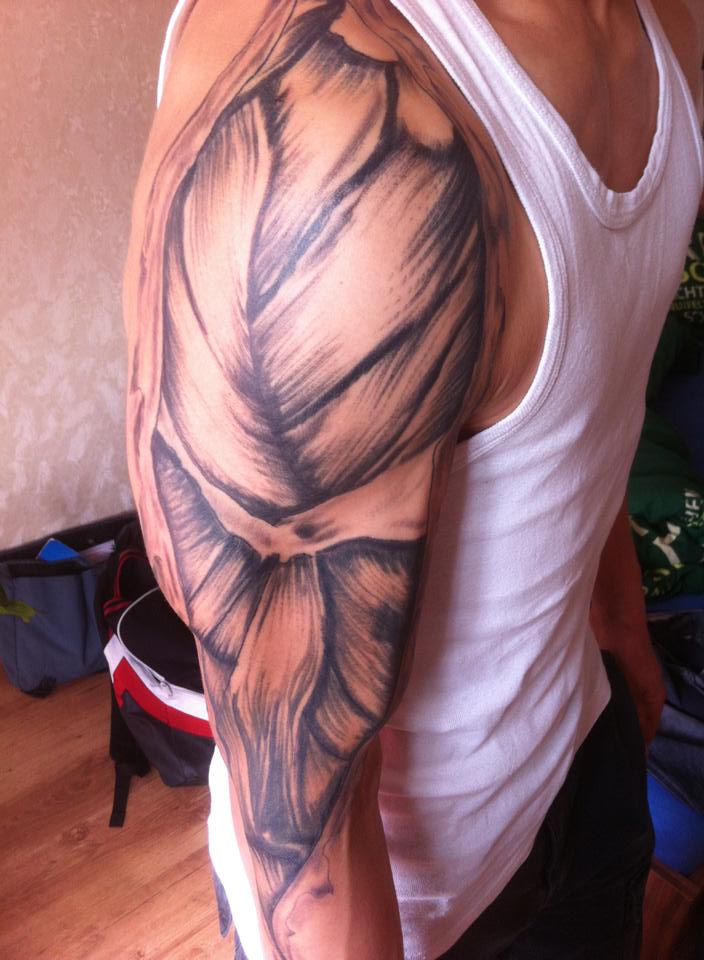 Black And Grey Muscle Tattoo On Man Right Half Sleeve
