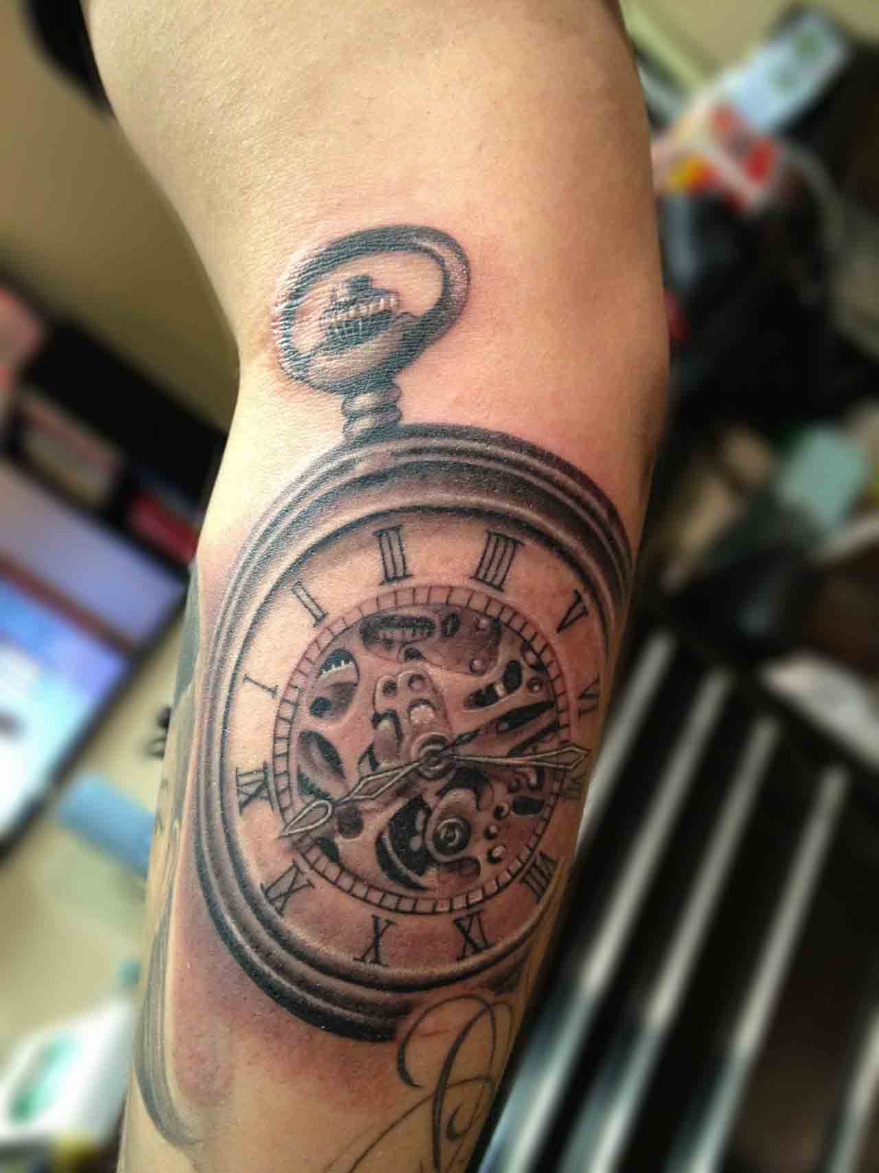 Black And Grey Pocket Watch Tattoo On Forearm