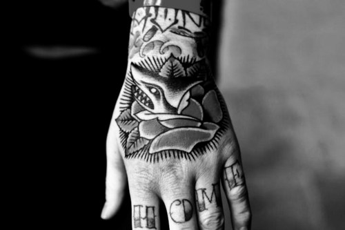 Black And White Flower Tattoo On Left Hand