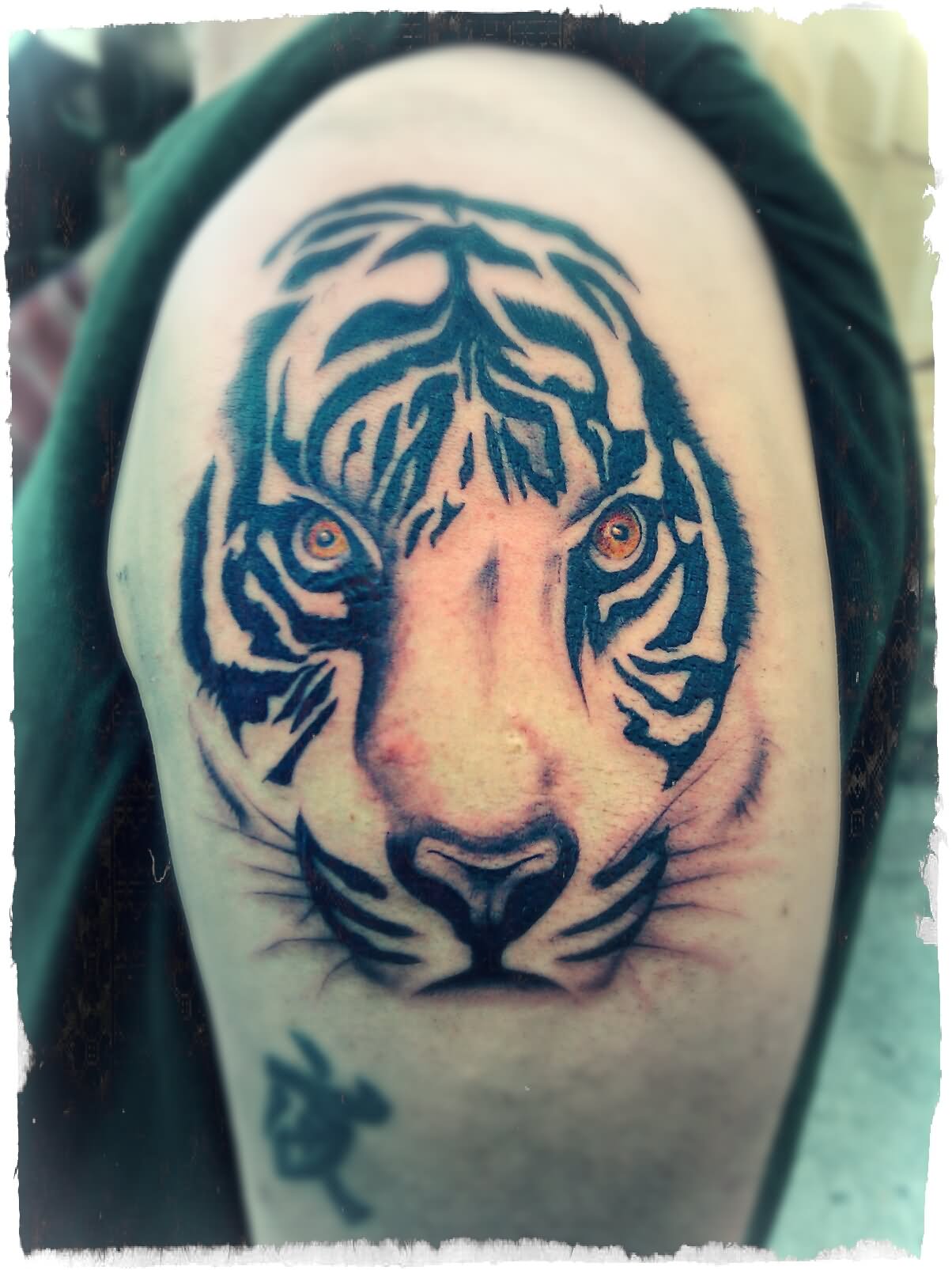 Black And White Tiger Head Tattoo On Left Shoulder