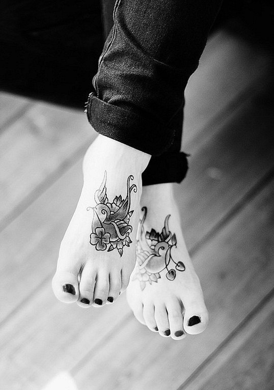 Black Ink Bird With Flower Tattoo On Girl Feet