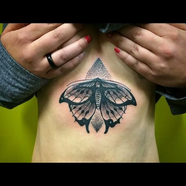 Black Ink Butterfly Tattoo On Under Breast