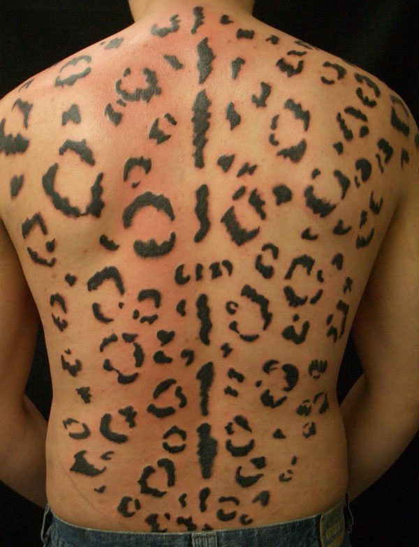 Black Ink Cheetah Print Tattoo On Man Back Body