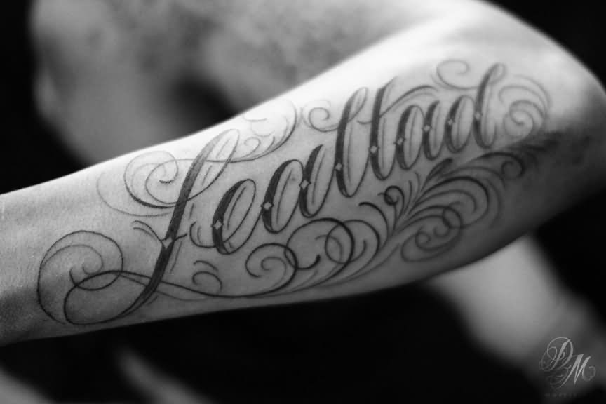 Black Ink Loyalty Tattoo On Forearm