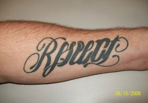 Black Ink Respect Tattoo On Left Forearm