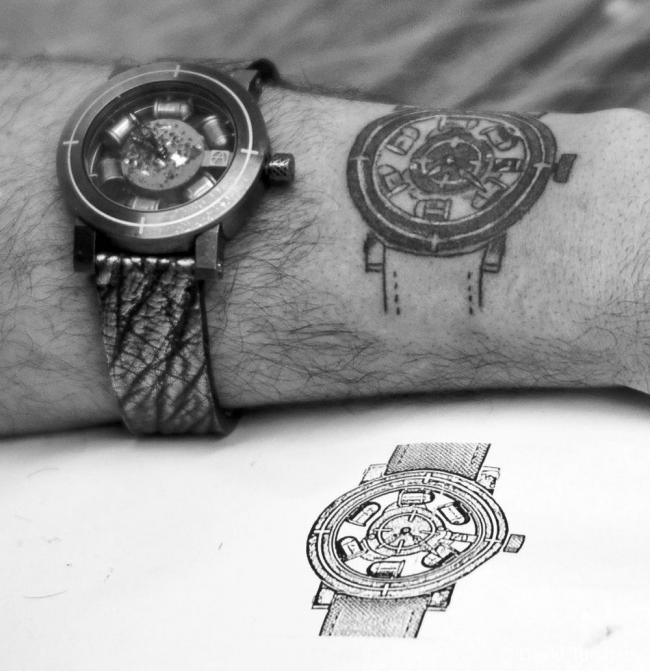 Black Wrist Watch Tattoo On Upper Wrist