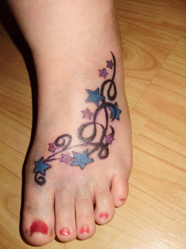 Blue And Purple Stars Tattoo On Girl Foot