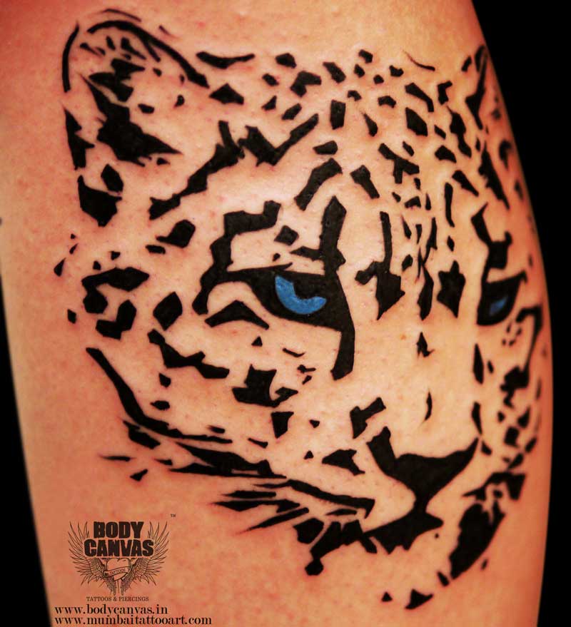 Blue Eyes Cheetah Head Tattoo