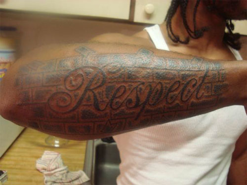 Brick Wall And Respect Tattoo On Right Sleeve