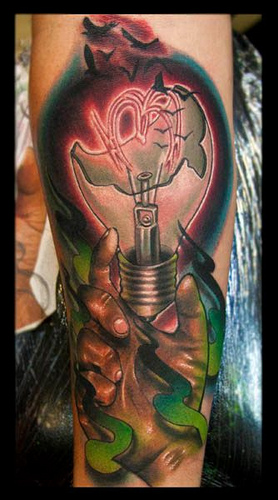 Broken Light Bulb In Hand Tattoo On Forearm