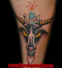 Burning Candle With Banner On Goat Head Tattoo Design