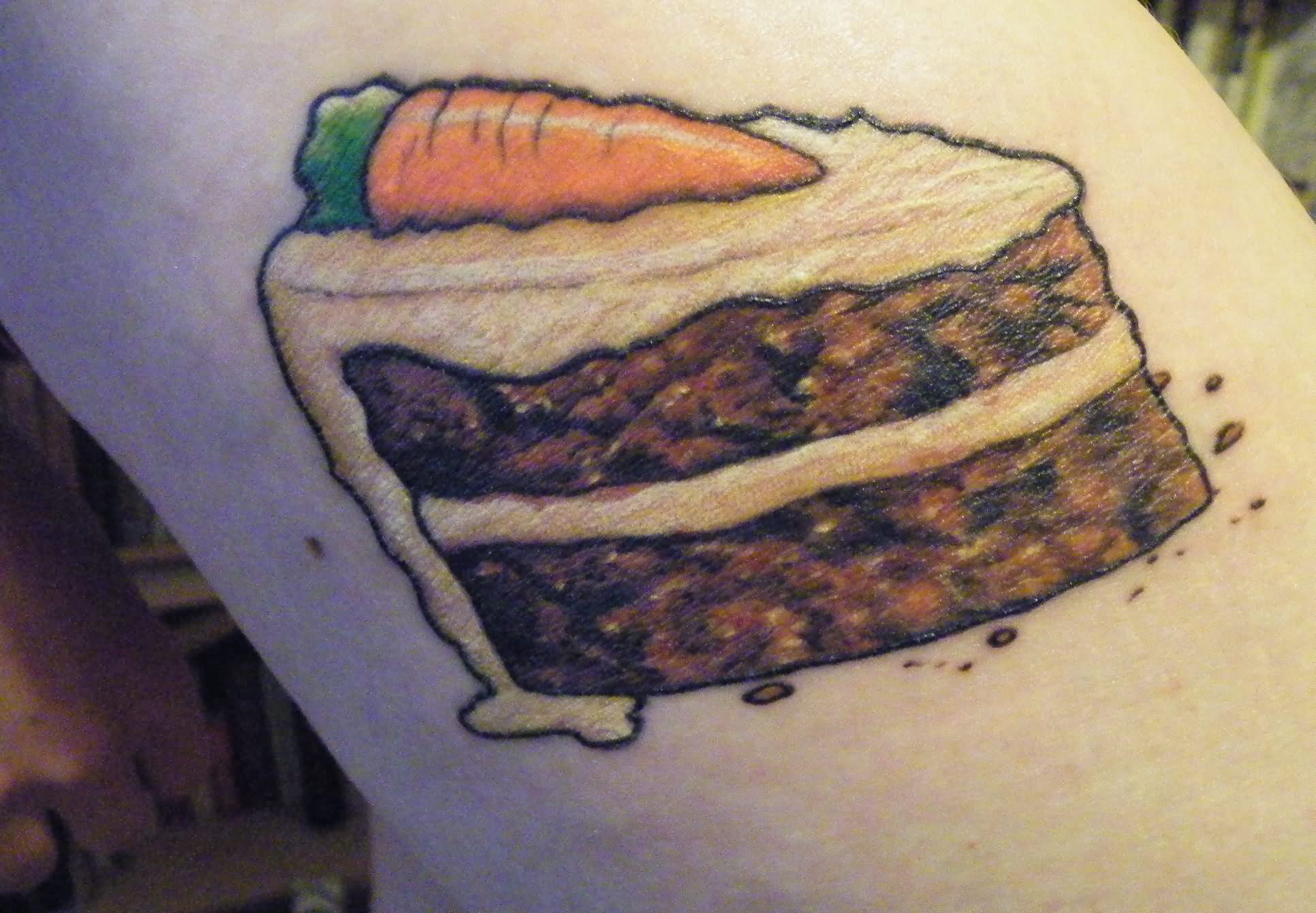 Carrot On Cake Piece Tattoo Design
