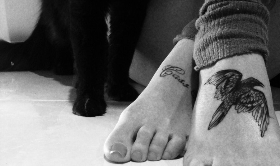 Cass Lettering And Bird Tattoo On Feet