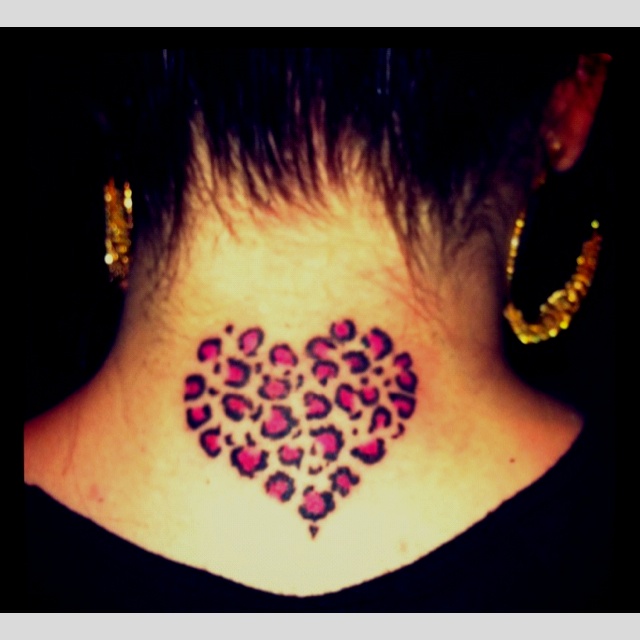Cheetah Print Heart Tattoo On Upper Back