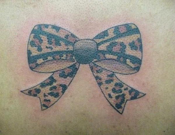 Cheetah Print In Bow Tattoo Image
