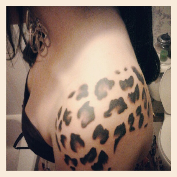 Cheetah Print Tattoo On Left Shoulder