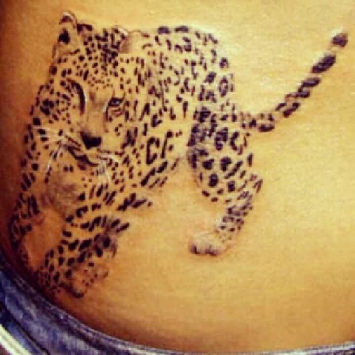Cheetah Tattoo On Girl Lower Back