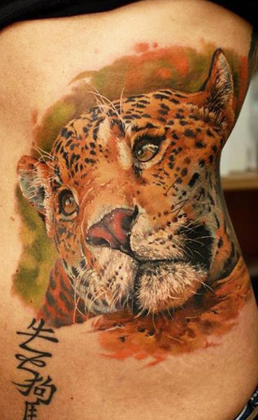 Colored Cheetah Tattoo On Back Body