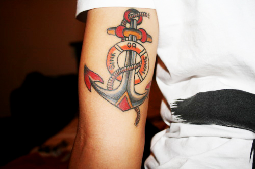 Colorful Anchor Tattoo On Inner Bicep