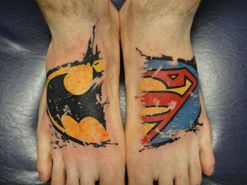 Colorful Batman And Superman Logo Tattoo On Feet
