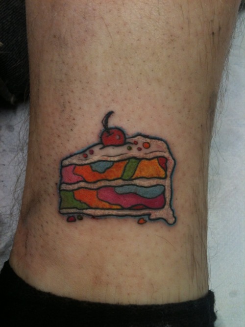 Colorful Cake Piece Tattoo Design For Leg