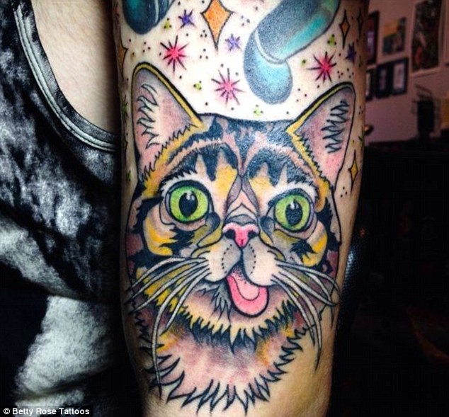 Colorful Cat Head Tattoo On Bicep