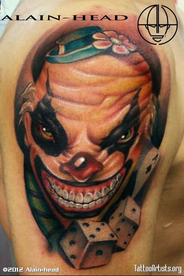 Colorful Clown Head With Two Dice Tattoo Design For Shoulder