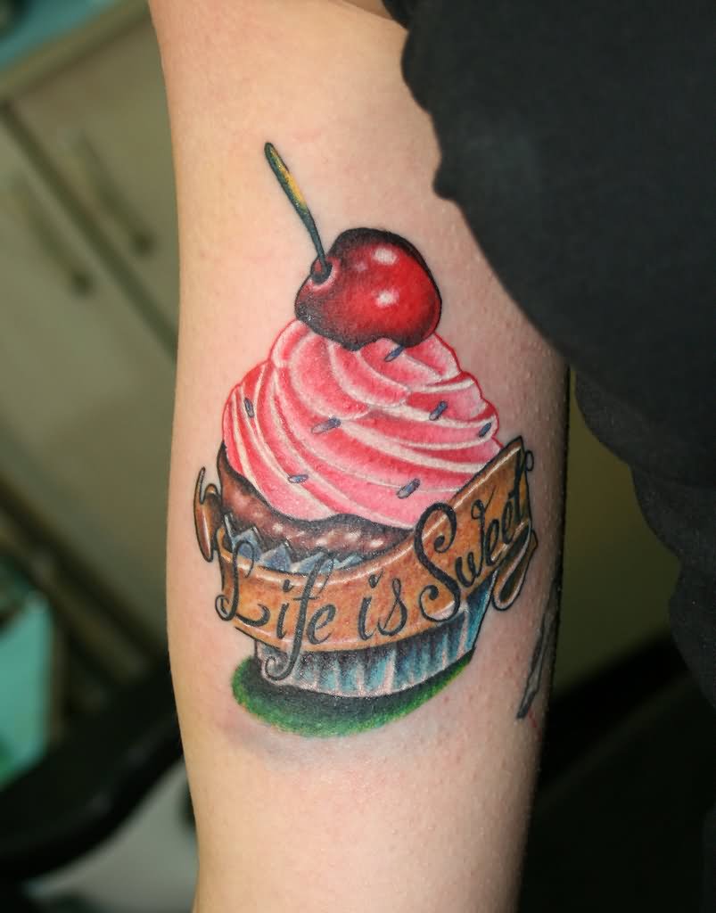 Colorful Cupcake With Banner Tattoo Design For Bicep