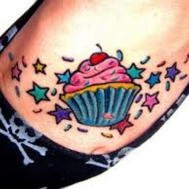 Colorful Cupcake With Stars Tattoo On Foot
