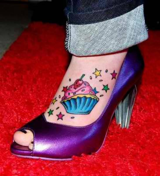 Colorful Cupcake With Stars Tattoo On Girl Foot