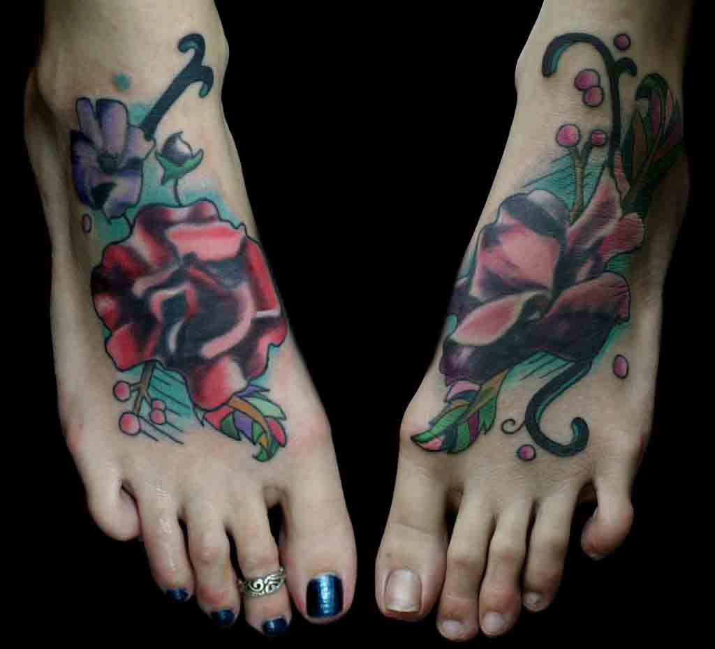 Colorful Flowers Tattoo On Feet