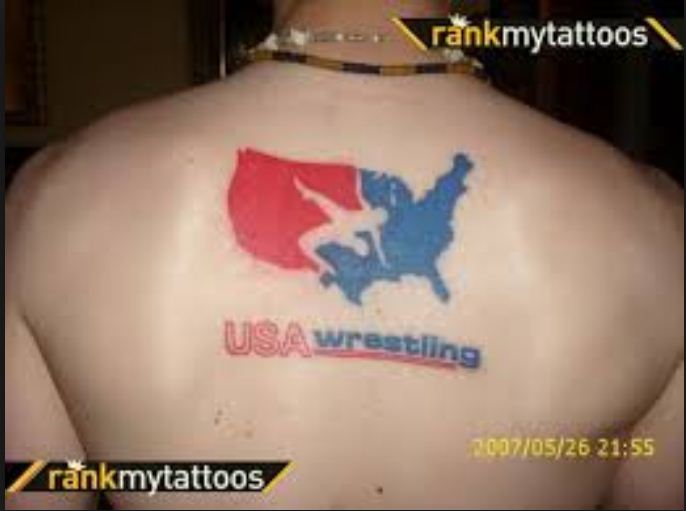 Colorful USA Wrestling Logo Tattoo On Man Upper Back.