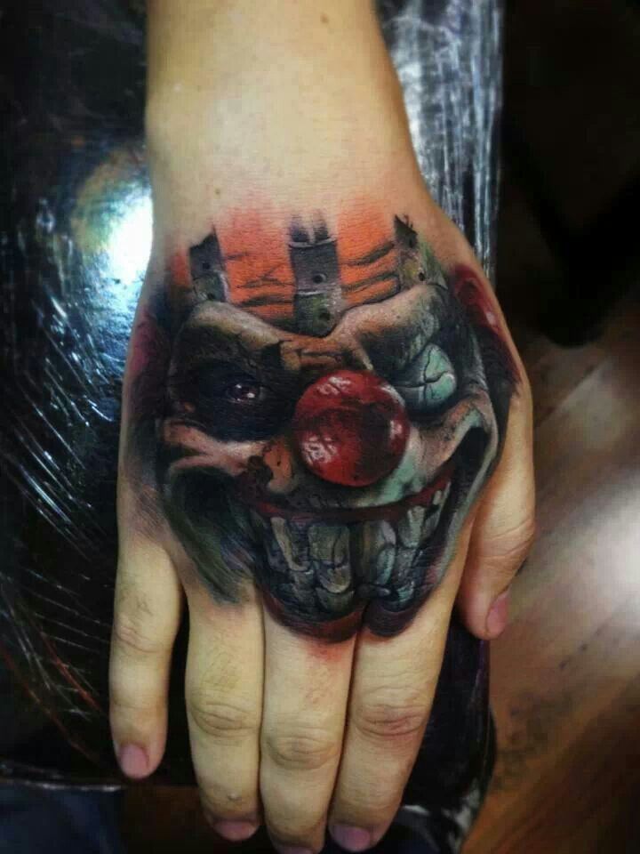 Colorful Vampire Clown Head Tattoo On Hand